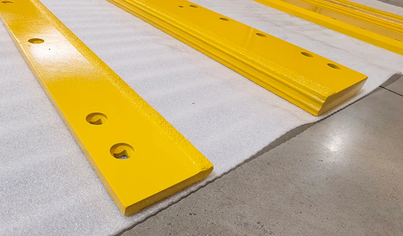 Carbide and Cover Cutting Edge: Pairing a Wear Cover with a Carbide Edge