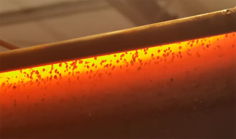 End view of a carbide highway plow edge showing section thickness and insert angle