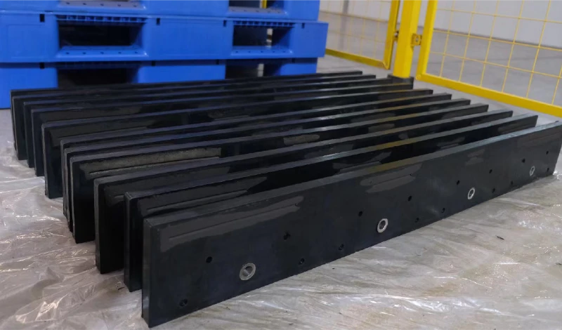 Replacement rubber-flex blade segments and mounting hardware packed for shipment to a fleet